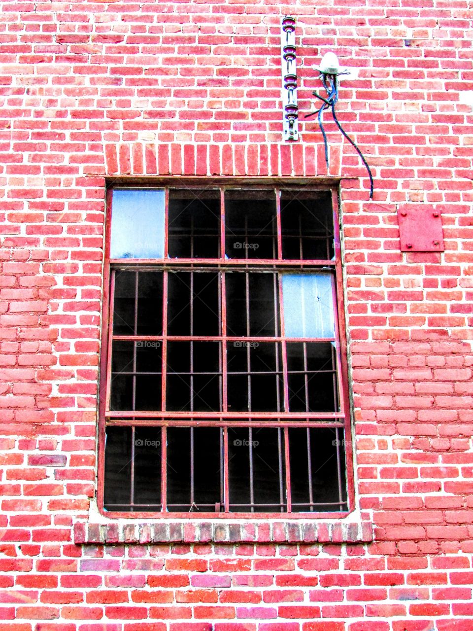 a window with broken window panes