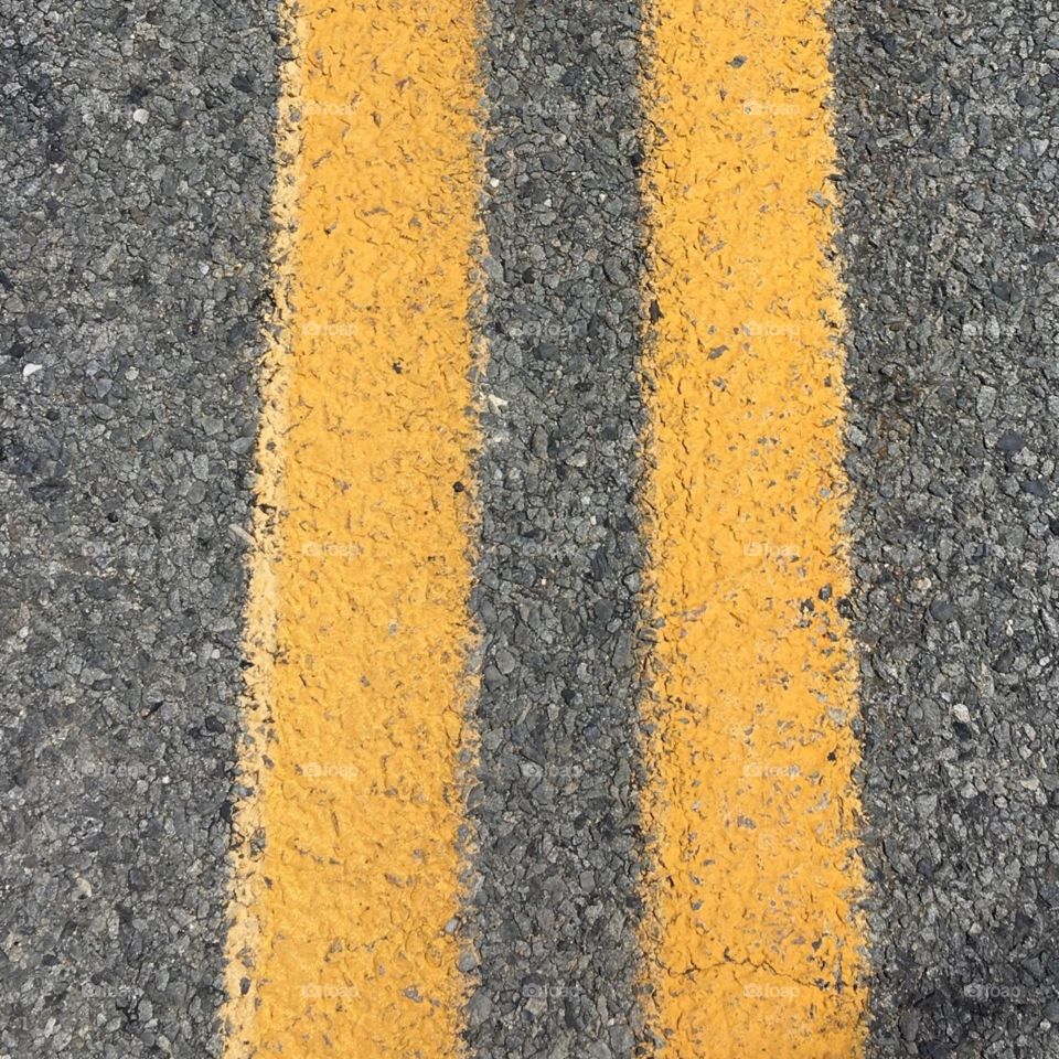 Two yellow lines in road, no passing, hurry!