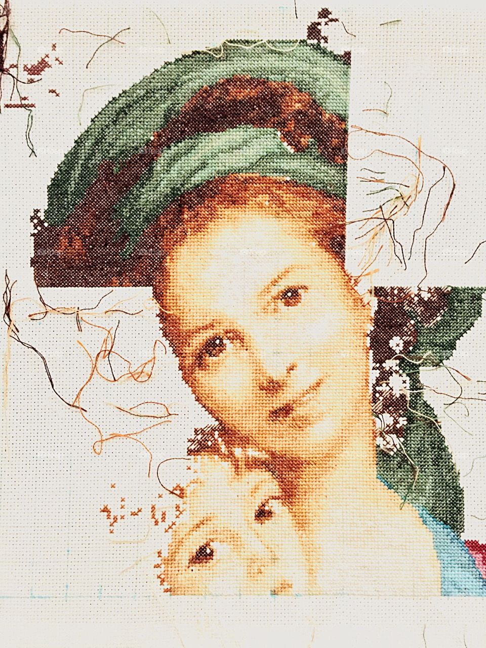 Embroidery of woman with child