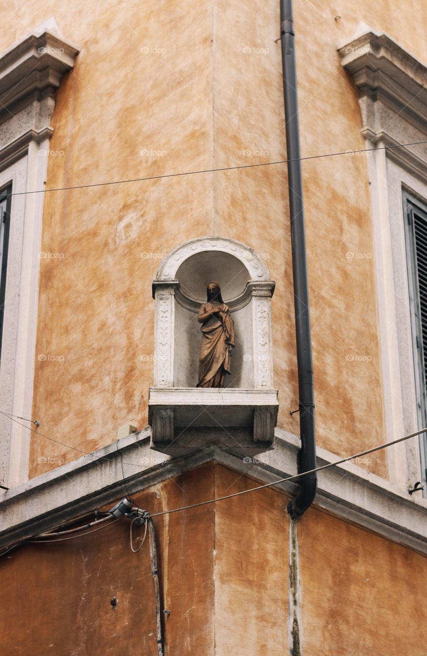 Statue of Mary on a building in Rome 