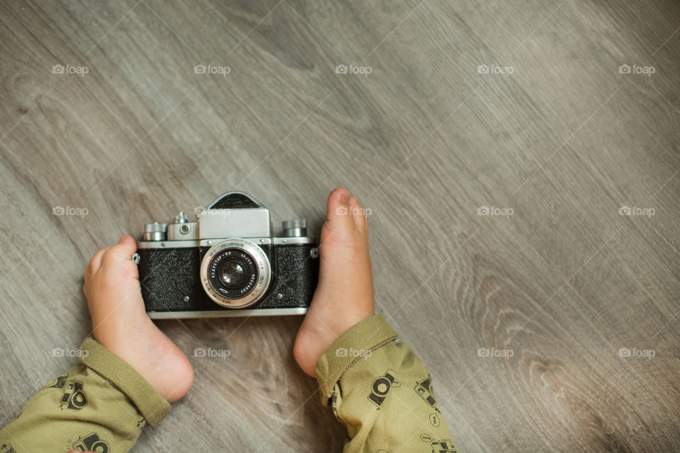 Little cute photographer, flatly 