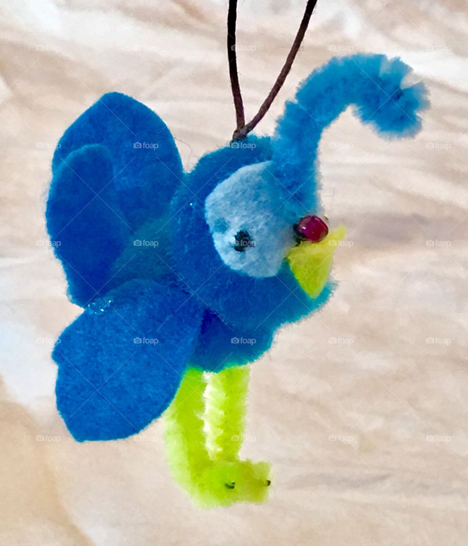 Tiny peacock ornament