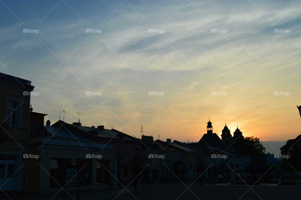 sunset in smal town in Poland