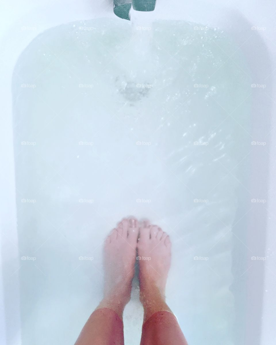About to Take a Bath, Feet in bathtub water 