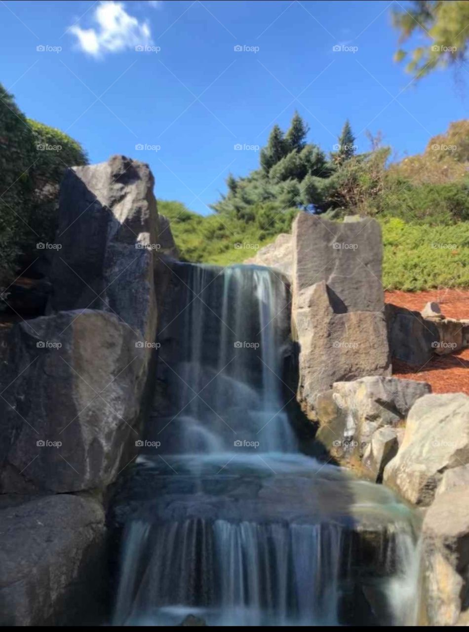 long exposure shot of tiny waterfall