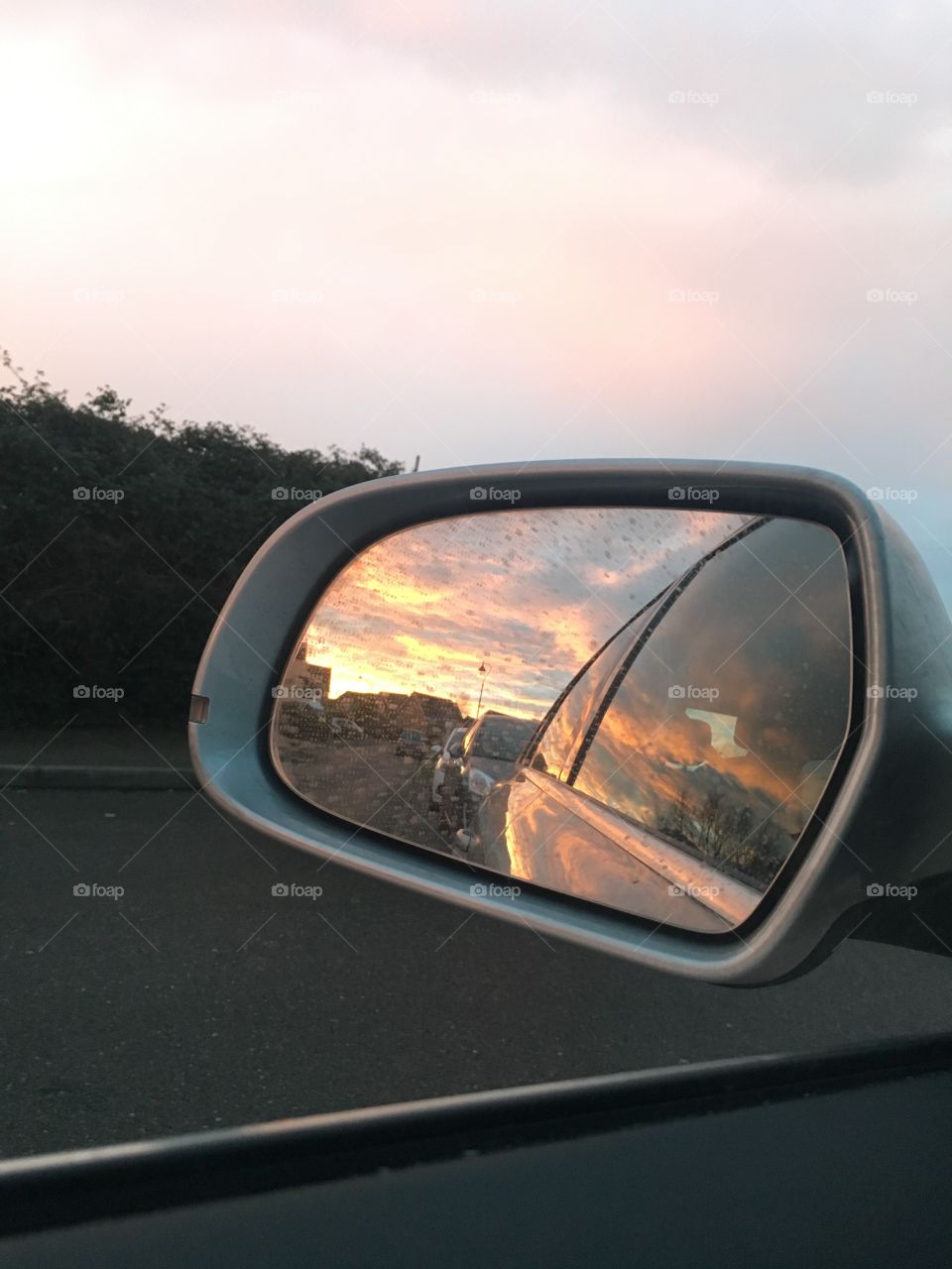 A beautiful reflection of the sunrise in a car wing mirror taken in Kent. Would look stunning in a frame or on a canvas