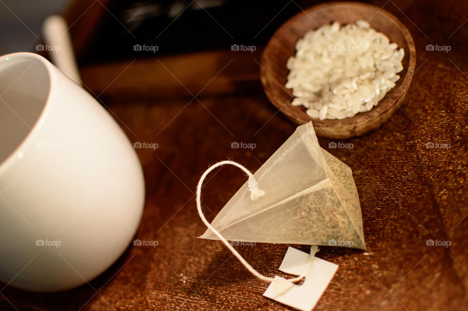 High angle view of tea cup with rice bowl