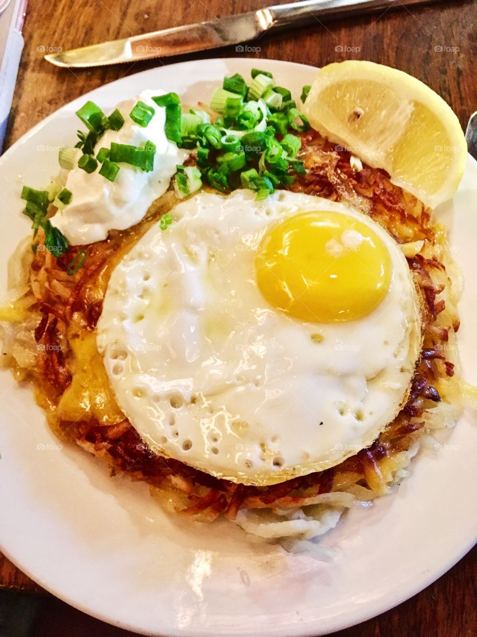 Cheese Rosti with egg, lemon and sour cream