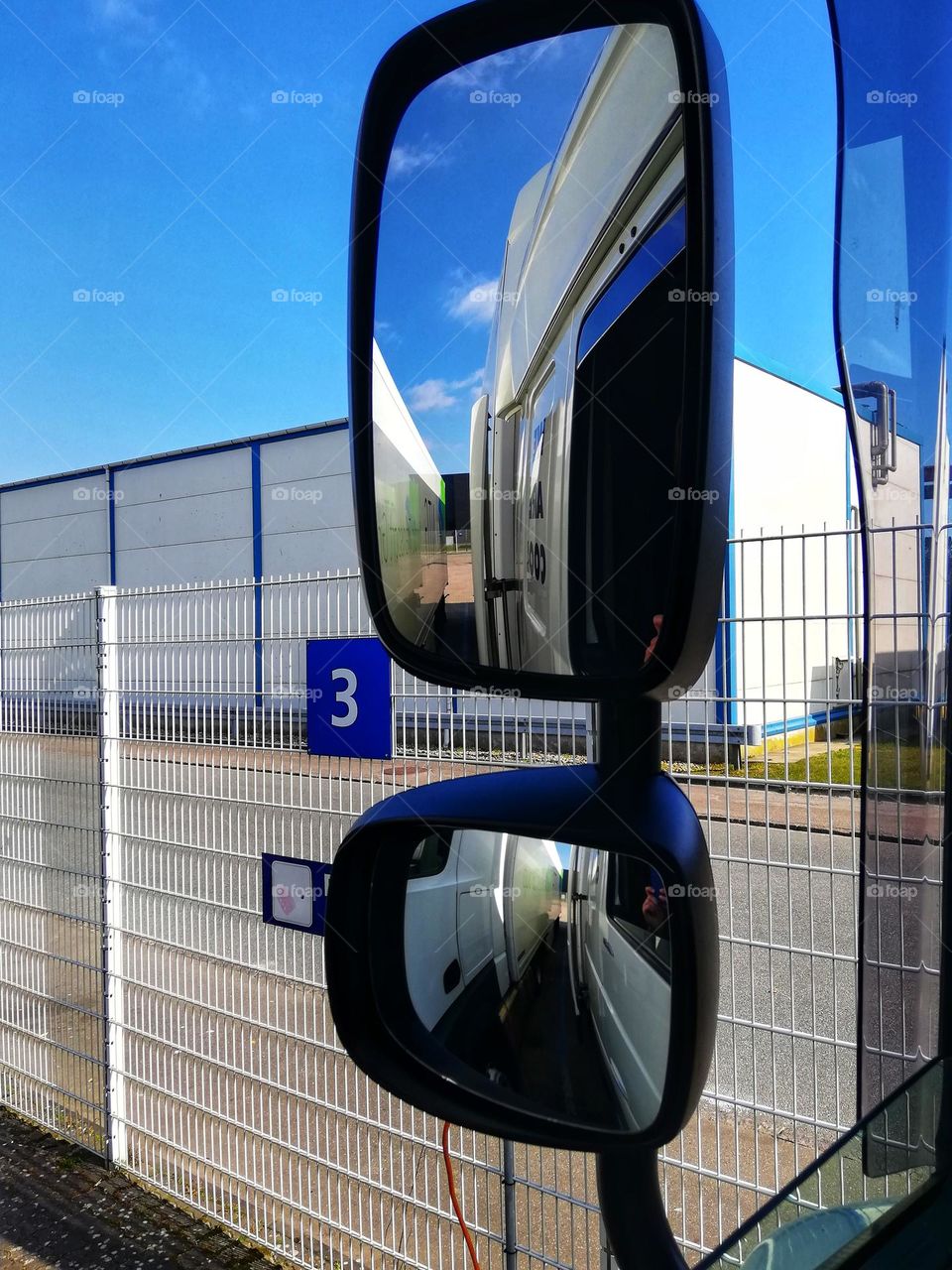 Trucking loading. View from the window from the ramp.