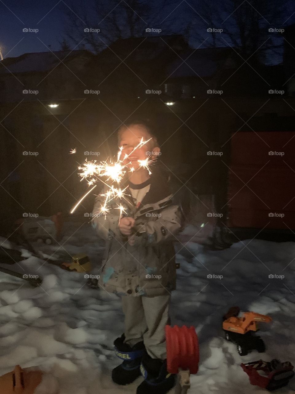 Lighting a sparkler to bring in the new year 