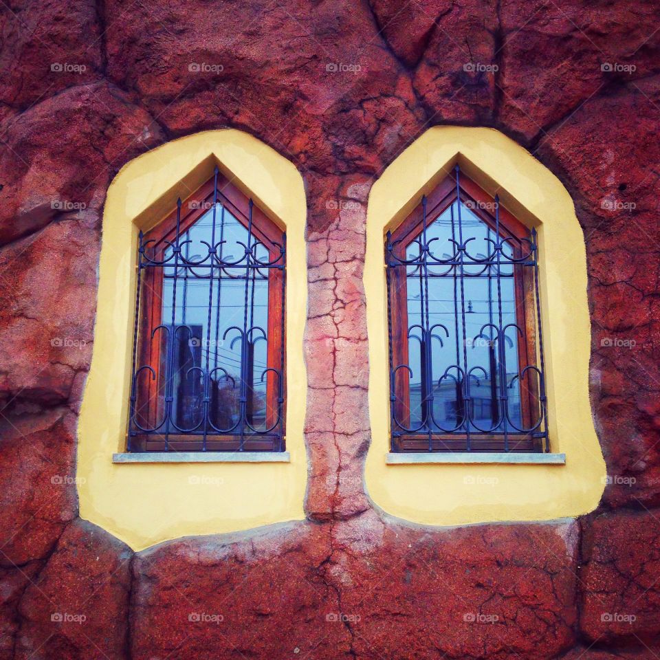 Bright windows on rustic wall in Moscow