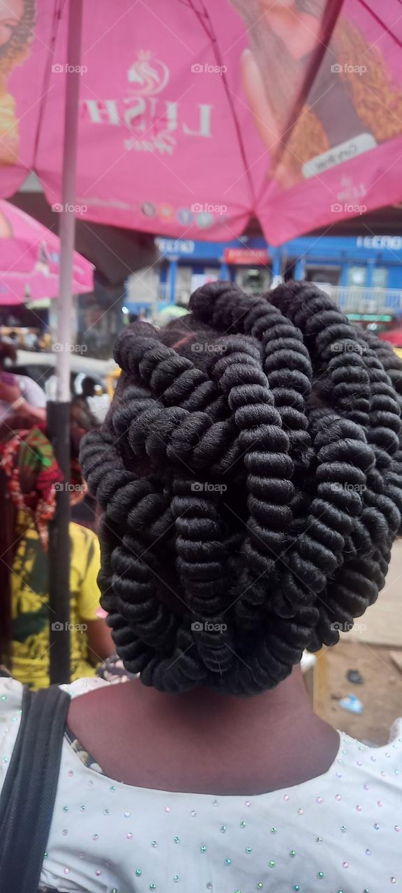 Beautiful African Woman hairstyle.A work of art