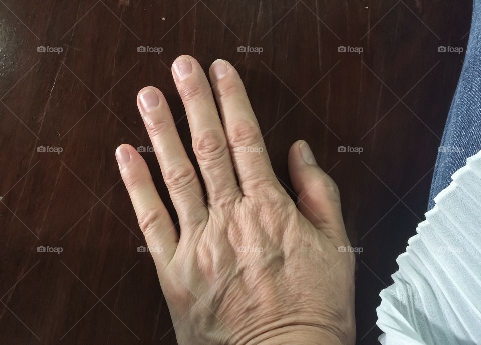 Aging woman's hand