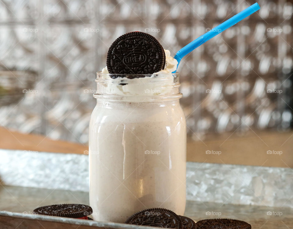 Cookies and Cream milkshake made with crushed Oreos.