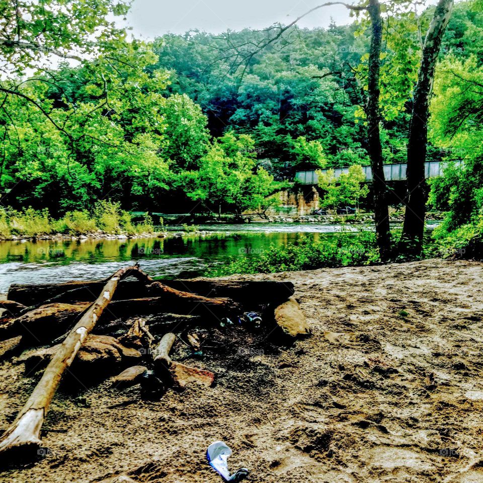 sandy river beach and fire pit