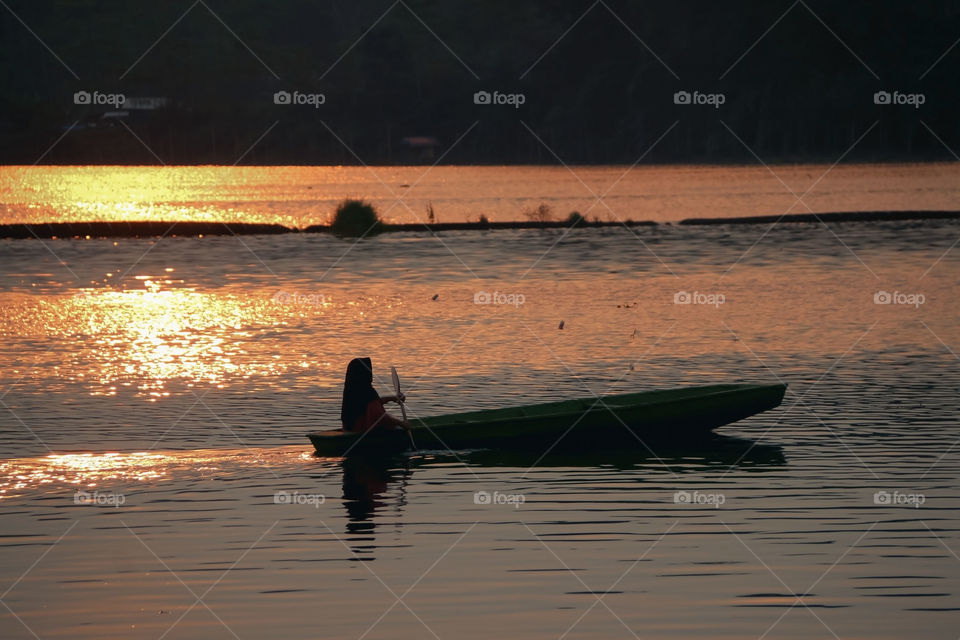 It was a beautiful, warm Evening. The sky is red and it is reflected in the water in this lake.