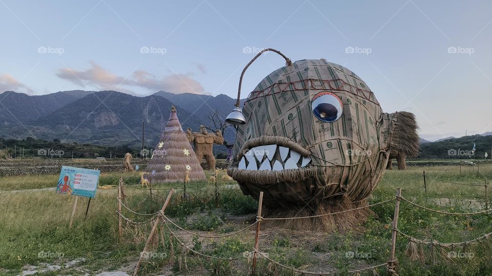 Straw fish statue in the park