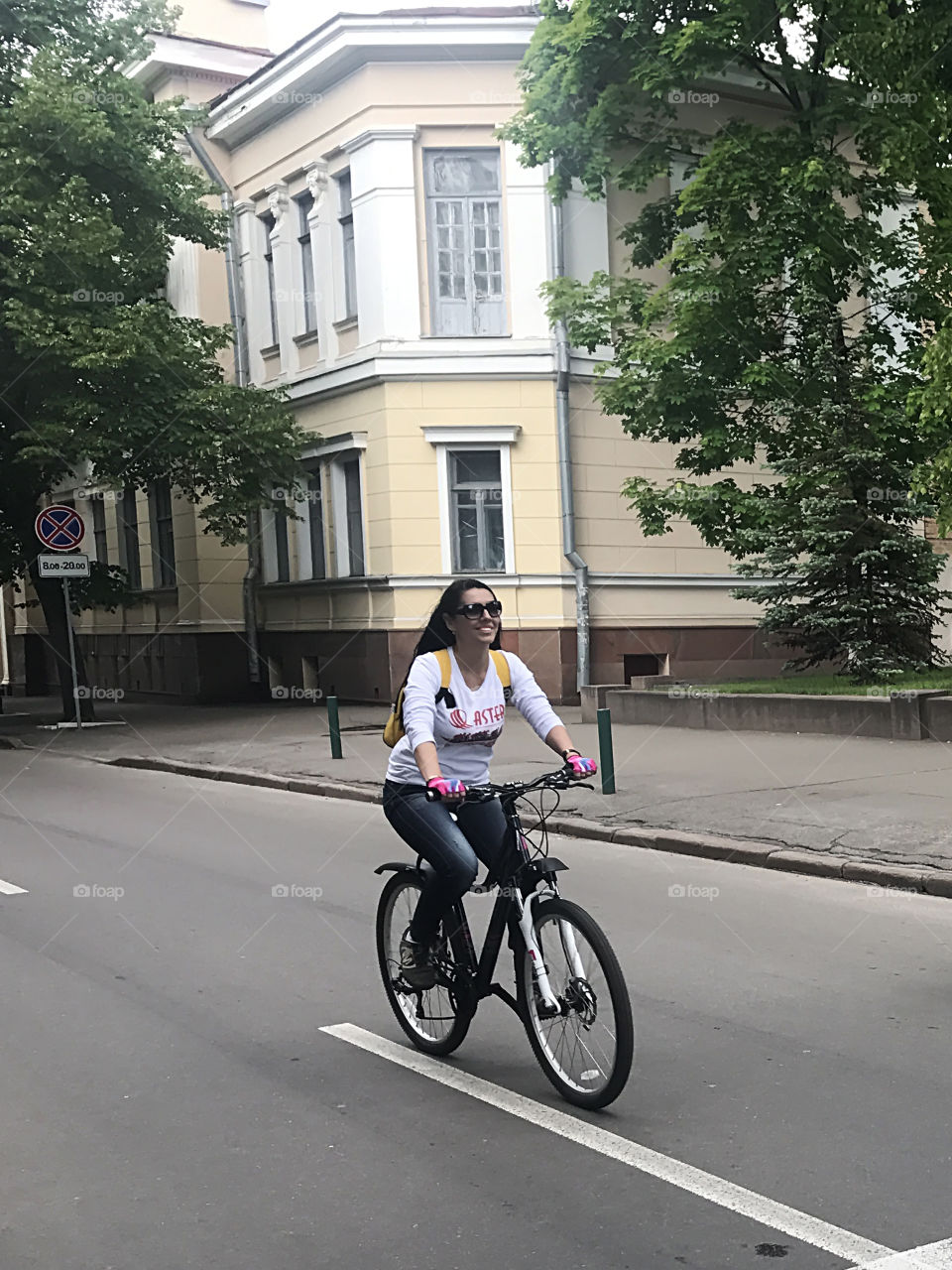 Enjoying the last summer days riding a bicycle in the city 