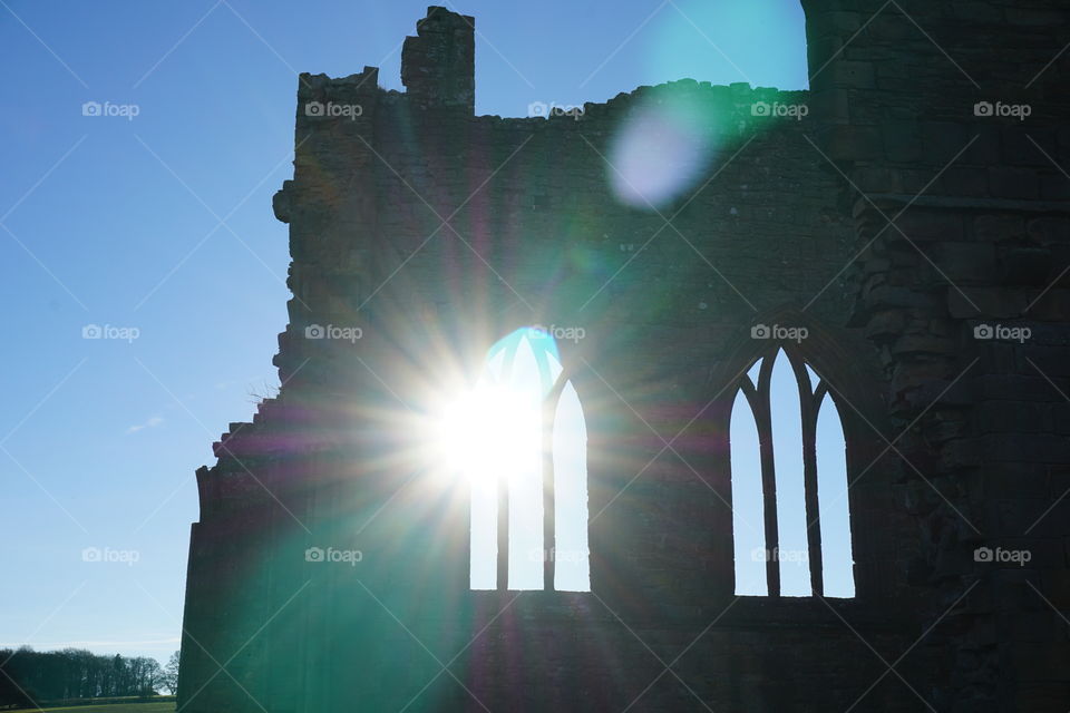 Egglestone Abbey sun going down ... peeping through the old arch stone windows 