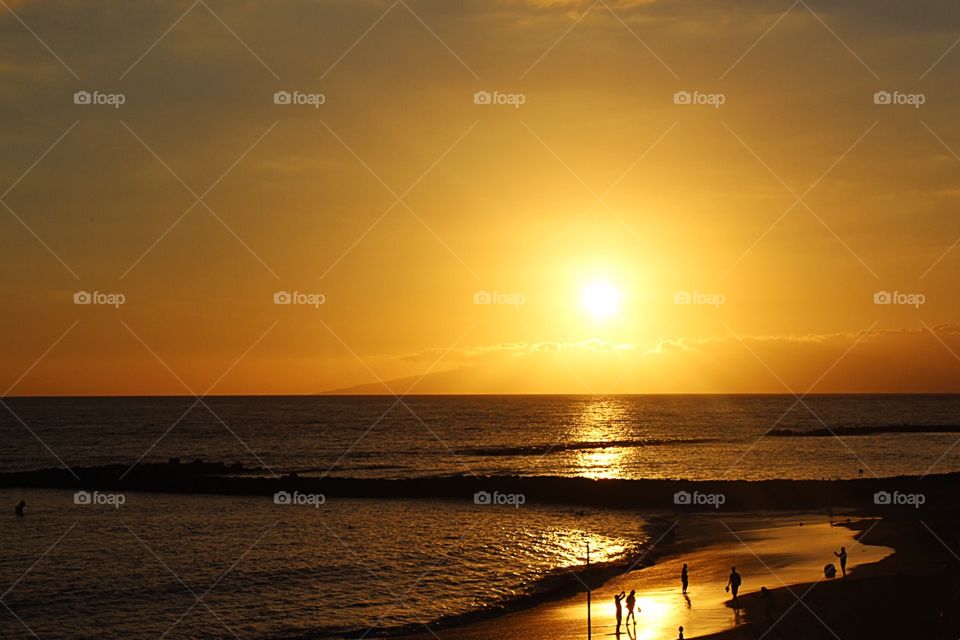 Sunset off the coast in Adeje, Tenerife, Canary Islands.