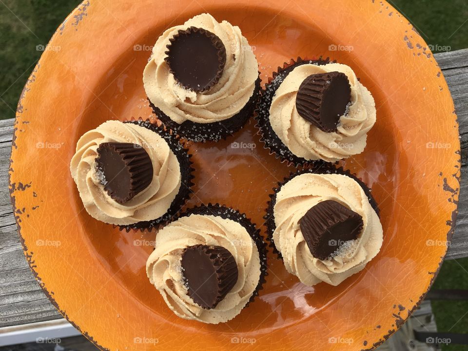 Chocolate Cupcakes with Peanut Butter Buttercream Icing topped with a Peanut Butter Cup