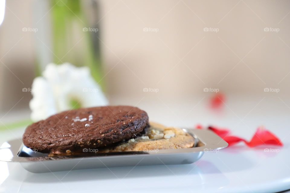 Cookies on a plate on white tabletop 