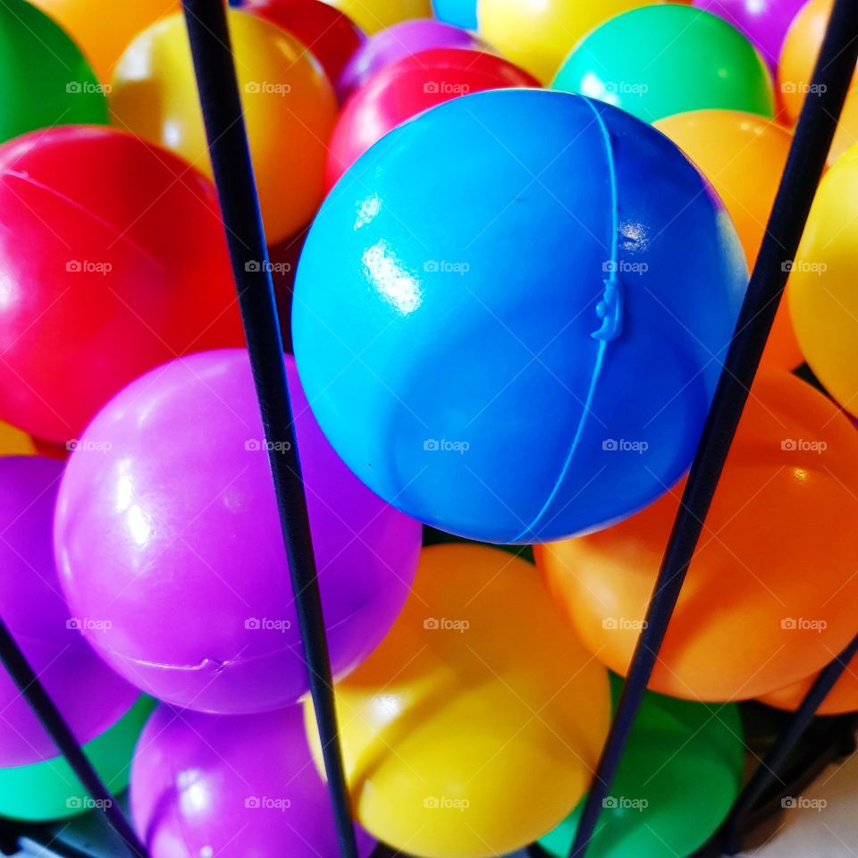 Multicolored balls in basket