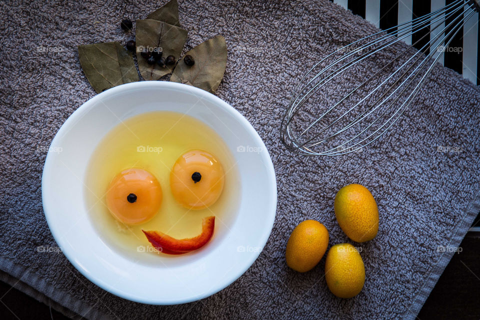 Bowl of egg forming smiley face