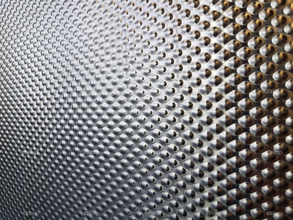 Extreme close-up of metal panel