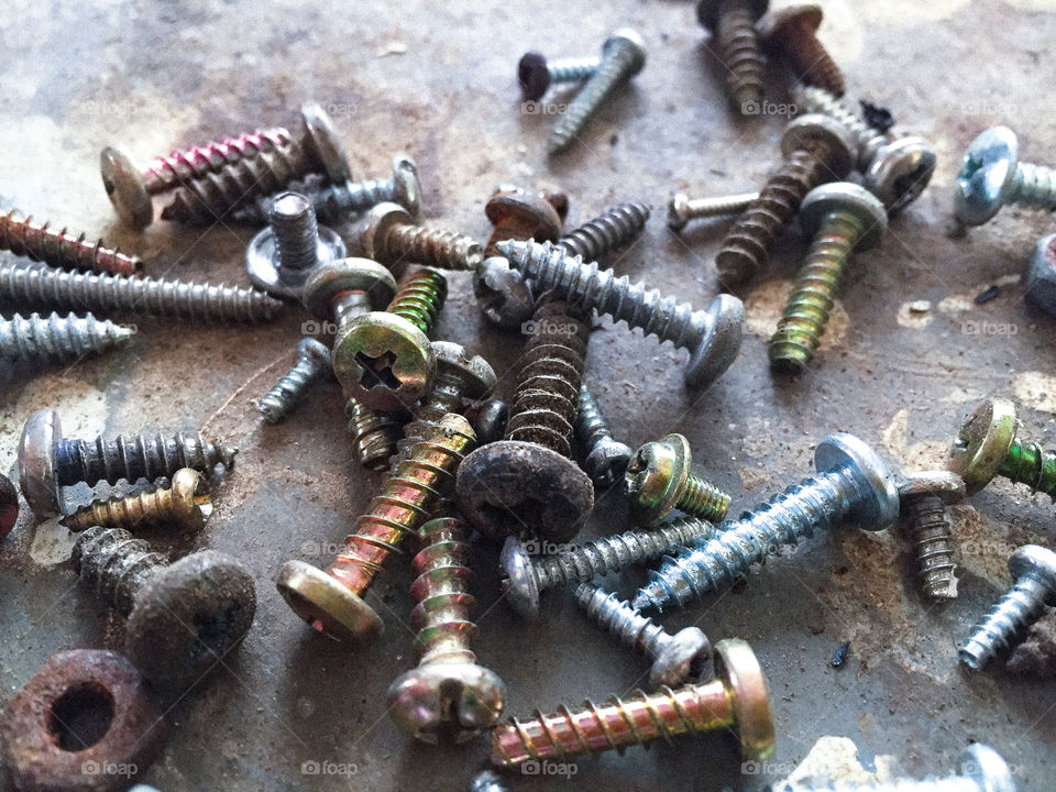 Keeping odd screws in the same container makes it hard to find the right one without dumping them all out!