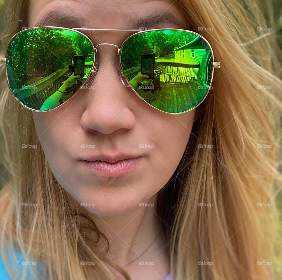 The hair and sunglasses make the look, woman outdoors