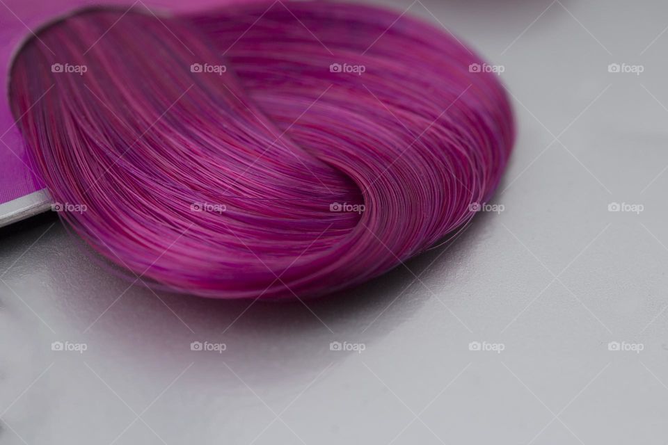 purple hair color samples. macro shot . trendy woman hairs purple colors . beauty fashion concept