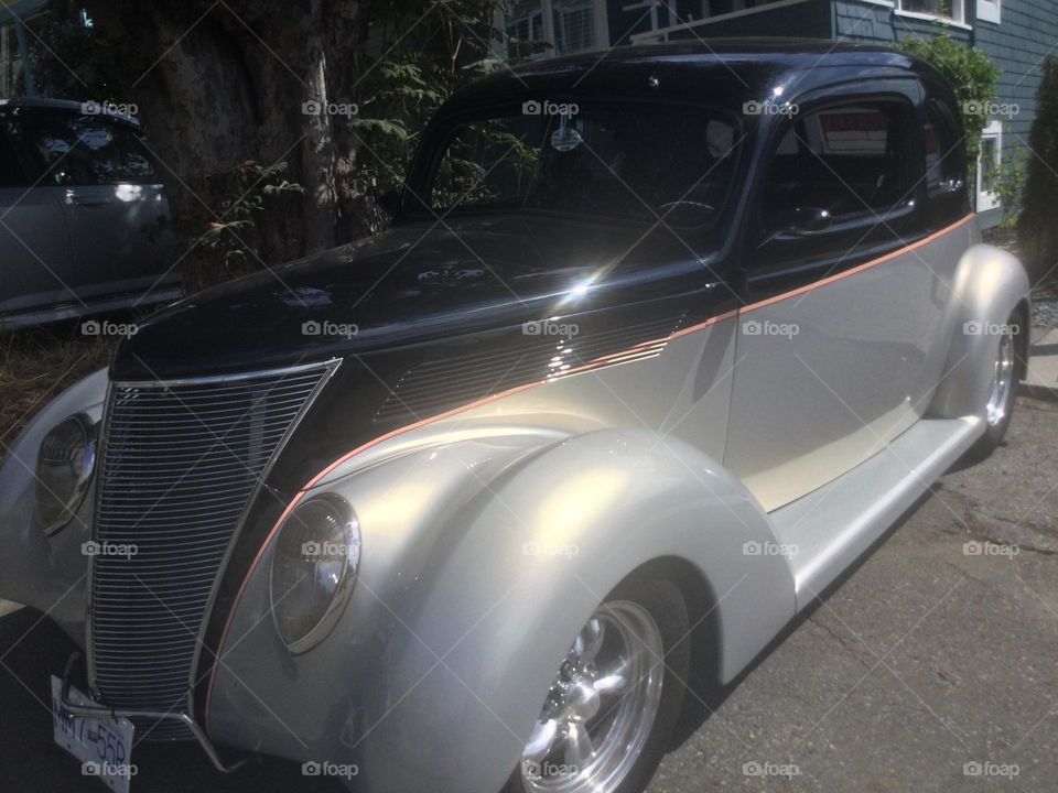 Vintage Black and White Car on the Road