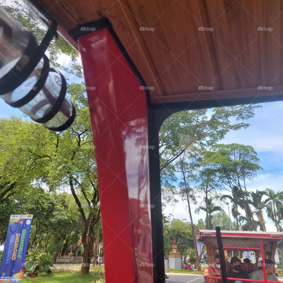 traveling by electric vehicle on empty streets with bicycle lanes on the side