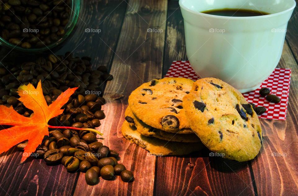 coffee been still life on wooden background