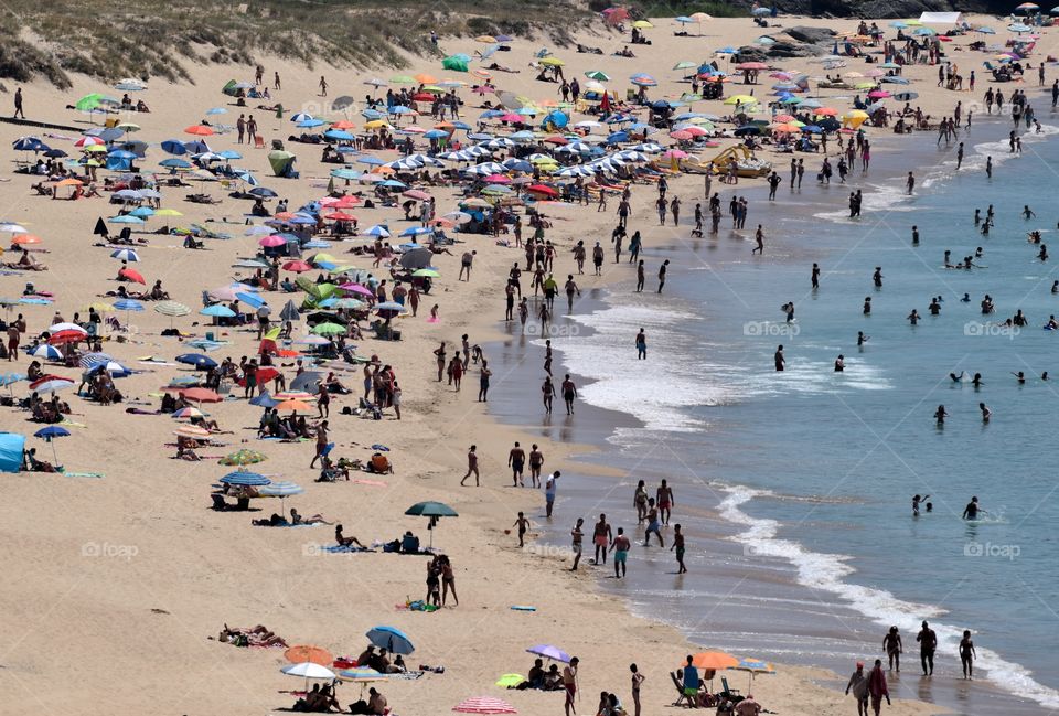 Holidaymakers on the beach.