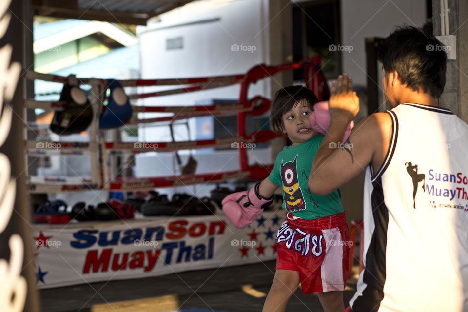 young boy boxing . model Thitiwin Dupont 