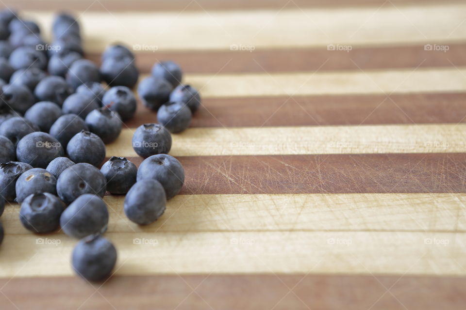 Blueberries on a cutting board ready for a healthy snack. 