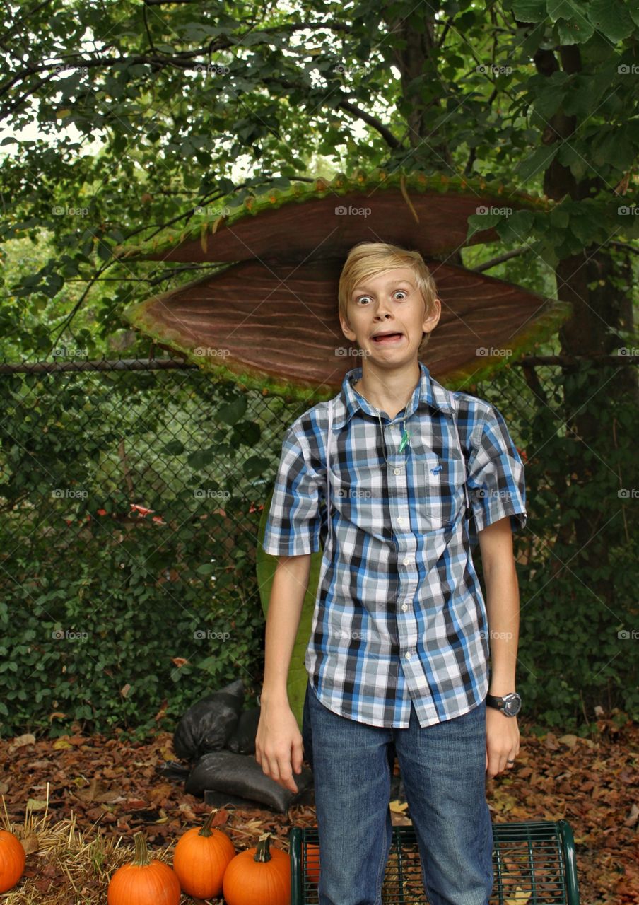 Boy eating Venus fly trap