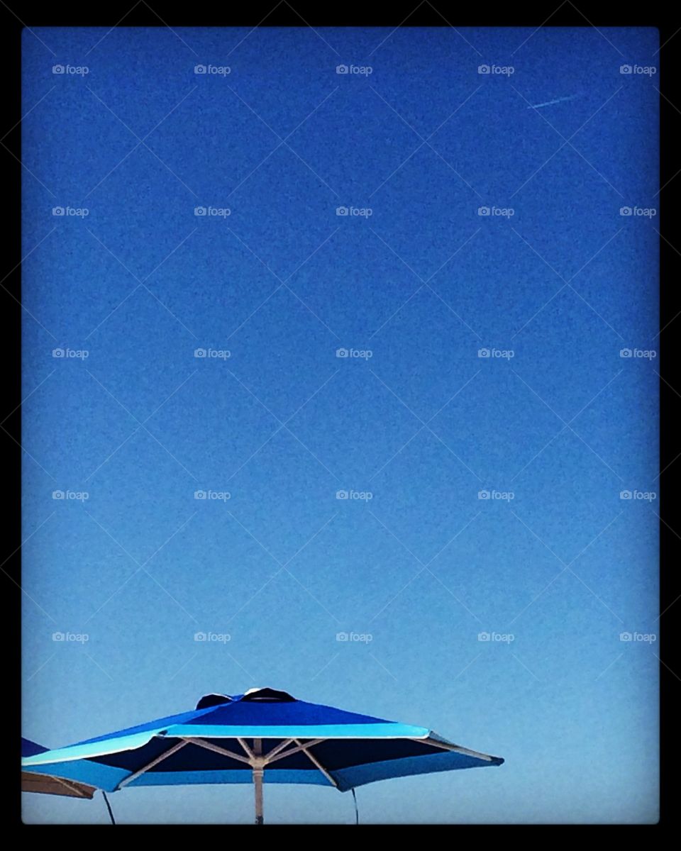 Umbrella. Clear sky at Mayflower Beach