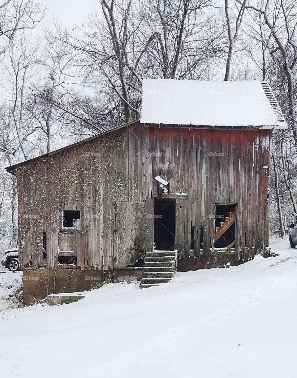 Snowy backyard barn