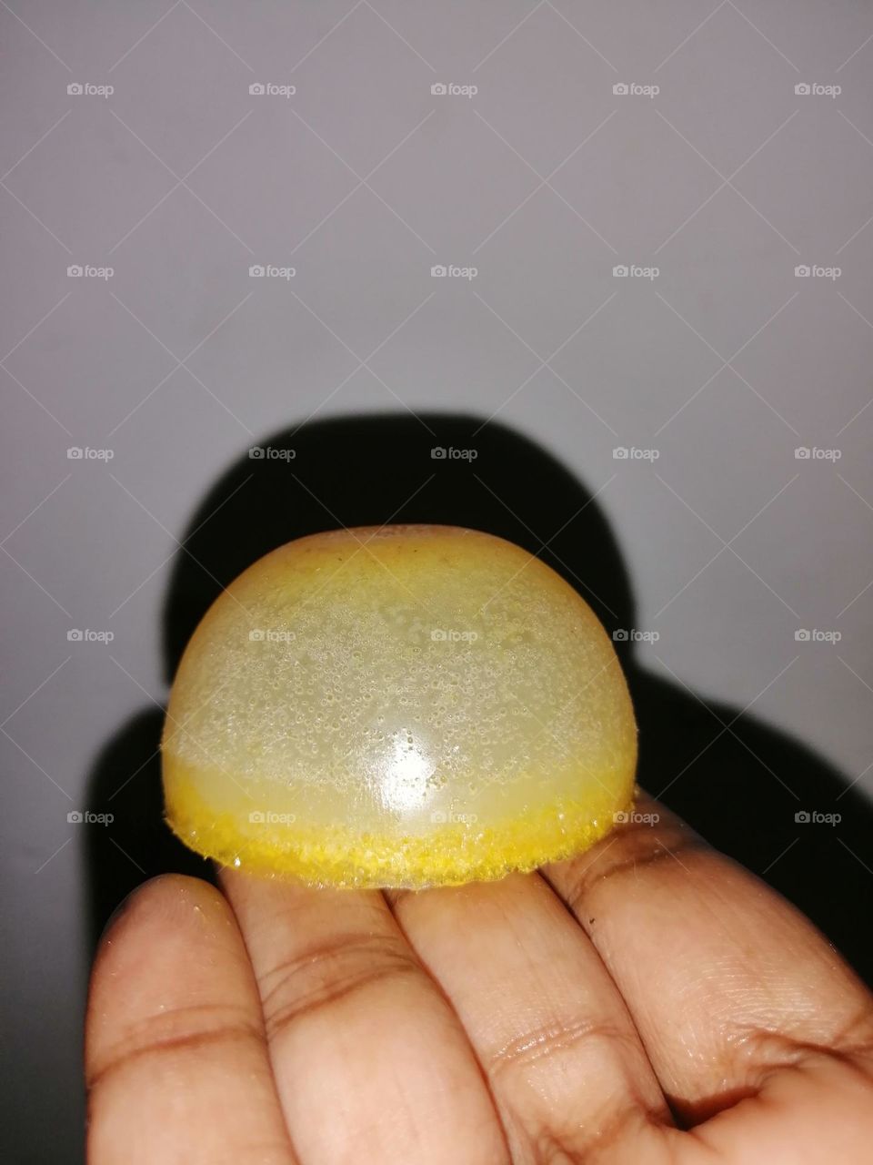 natural carrot home made soap in the hand