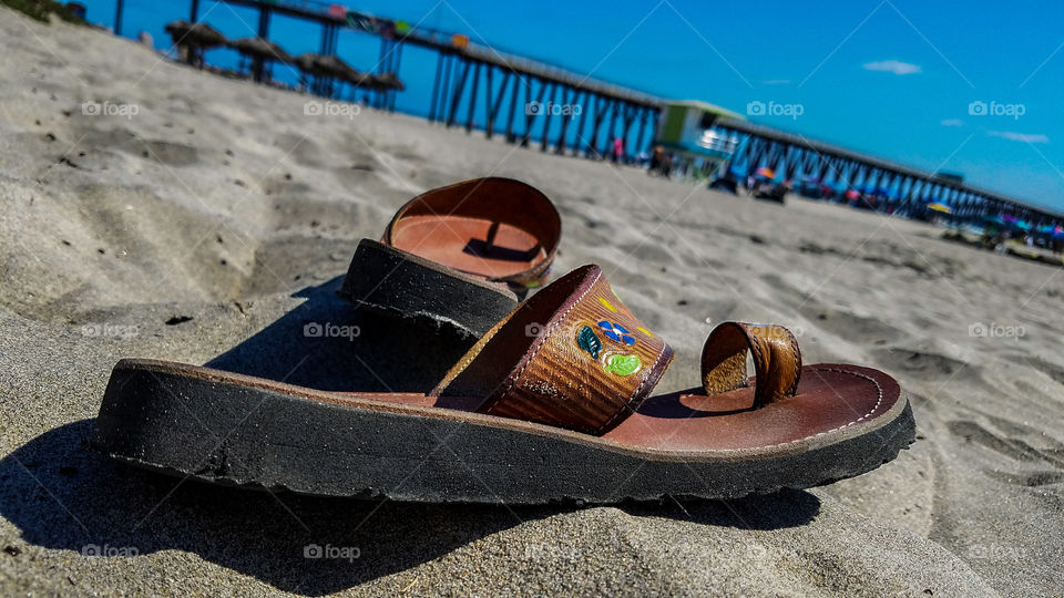 Sandals off on Beach