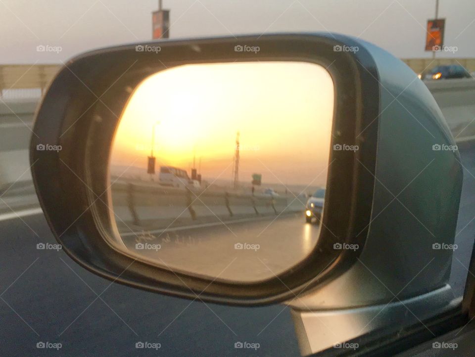 Sunset in side mirror 