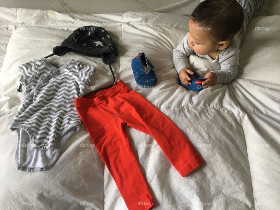 Morning ritual: setting outfit on the bed