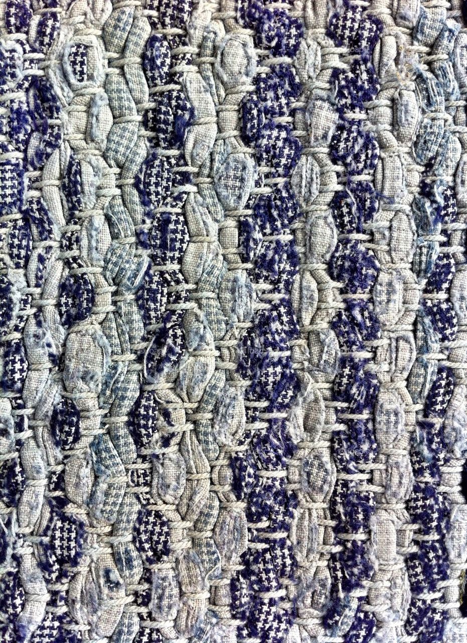 Woven rag carpet as background.
