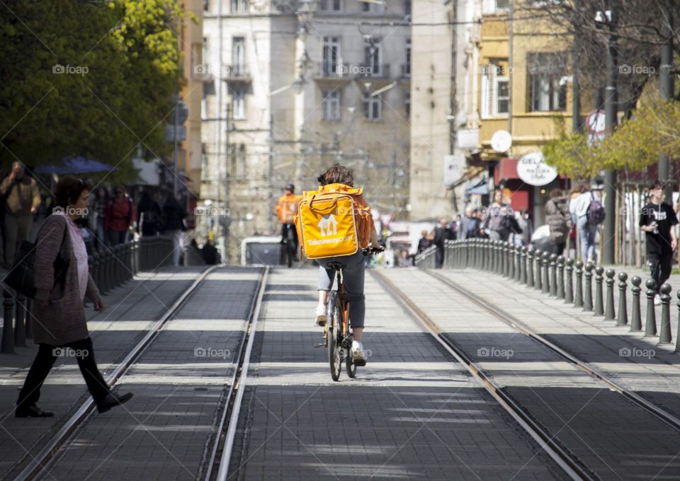 City life, food delivery by bike