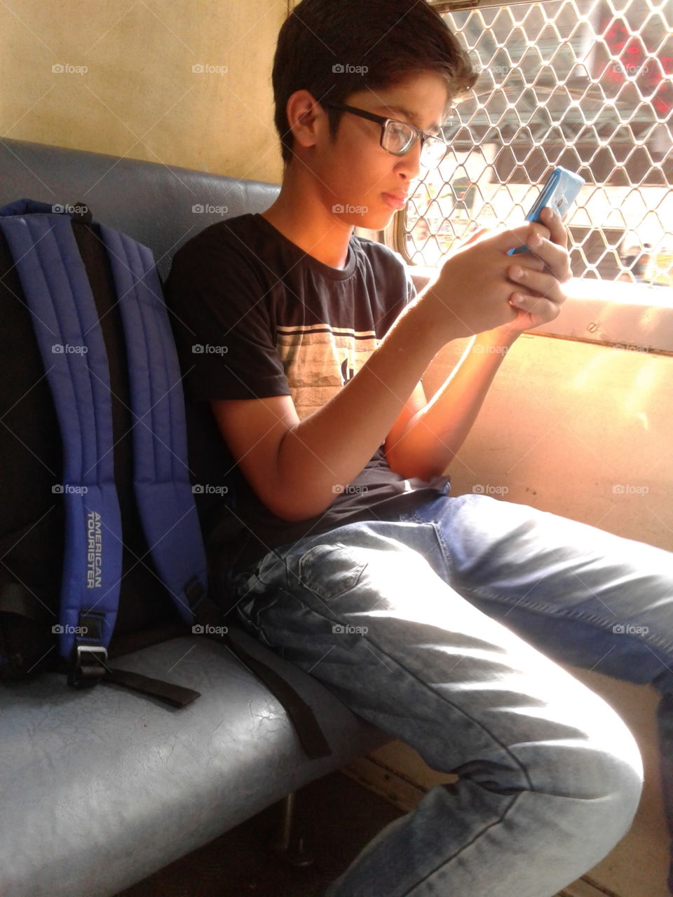 A little boy traveling solo in Mumbai Local Train.
