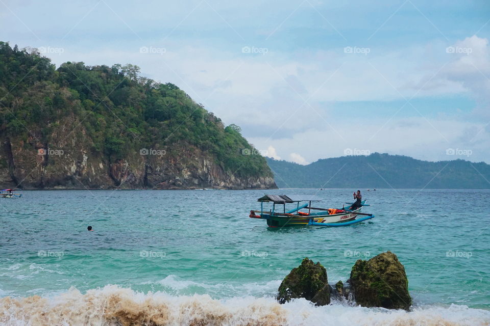 A sailor with his ship are ready to start the amazig journey.