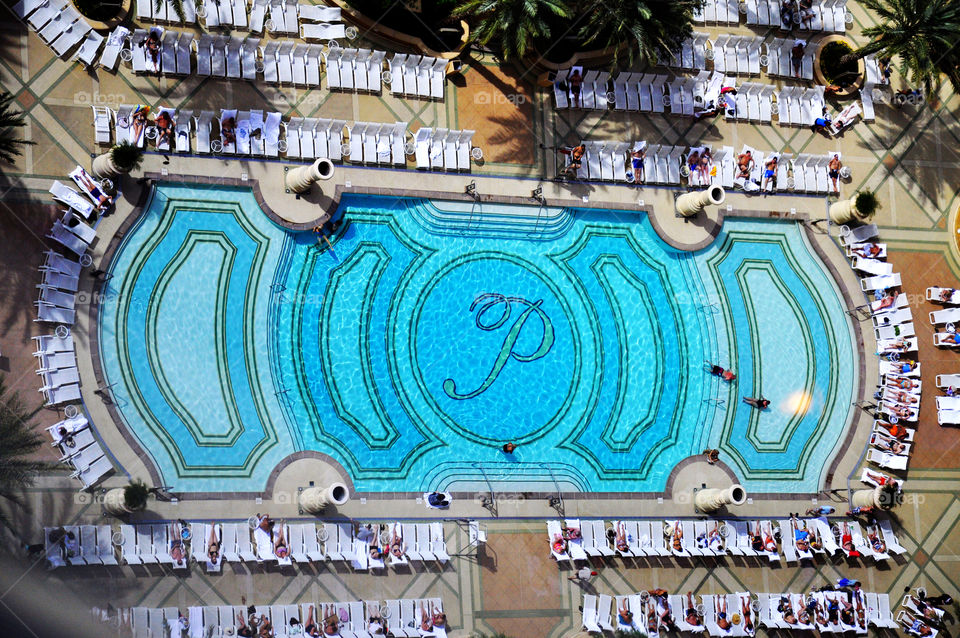 Looking down on a swimming pool. 